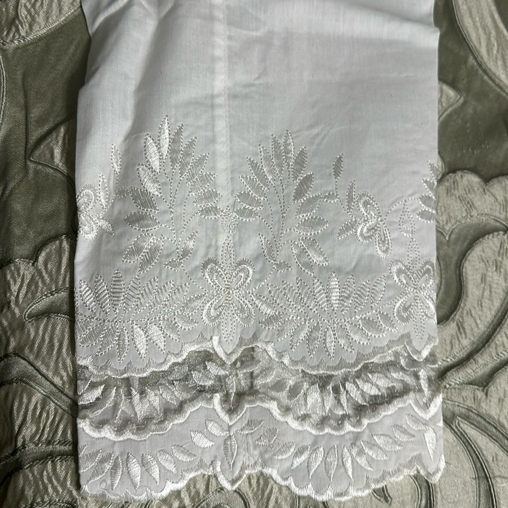 Straight leg pants with embroidered bottom